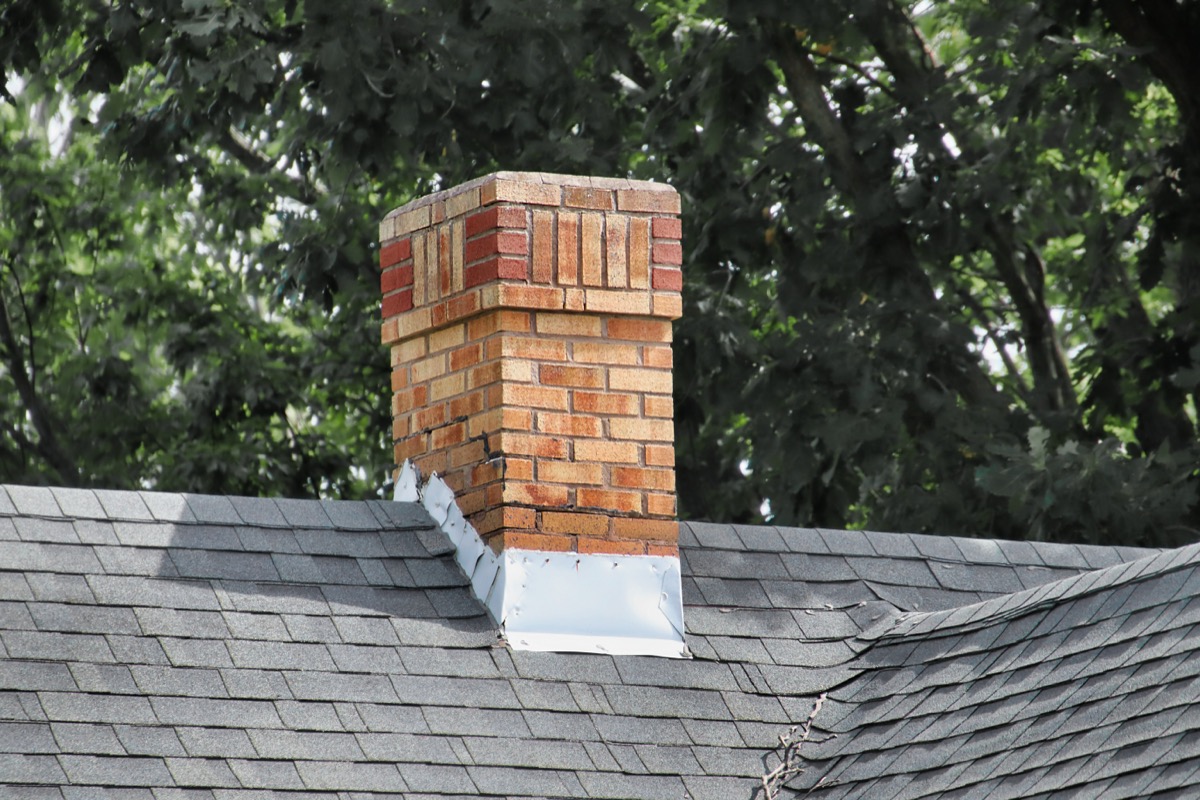 chimney repointing near me on a Philadelphia rowhome chimney
